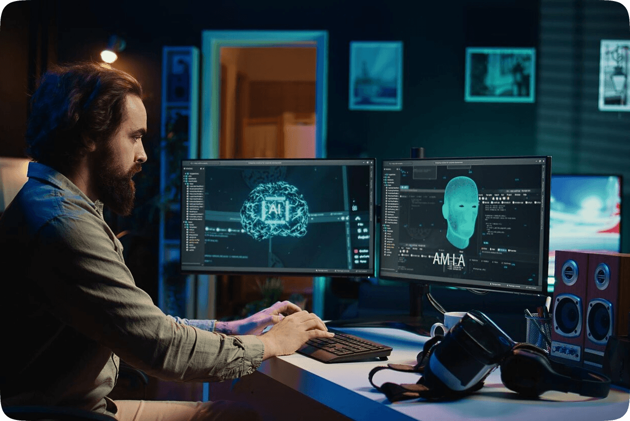 Security professional monitoring data on dual screens